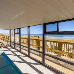 View of Sun Deck and Beach from indoor pool area
