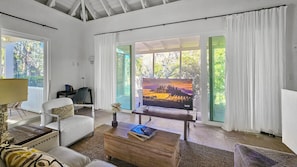 Airy and bright Living area with smart TV