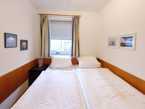 Schlafzimmer in der Ferienwohnung Inselnest am Meer in Wittdün auf Amrum