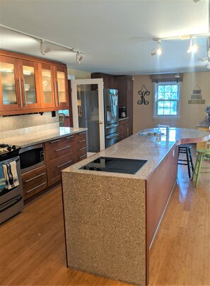 Large open kitchen with granite countertops