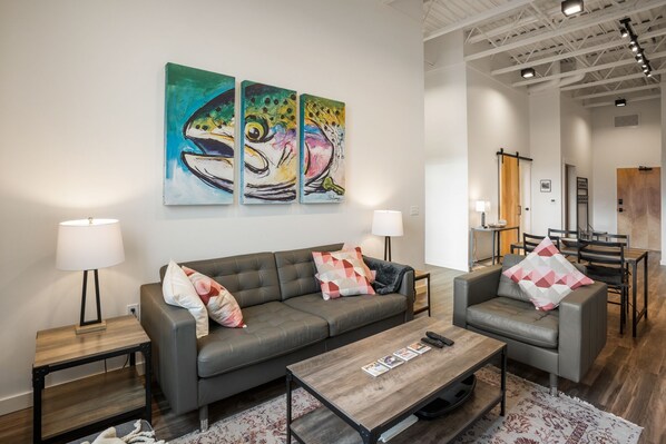 Open concept living dining and kitchen upon entering the unit.