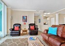 Comfortable living room with ample seating for six