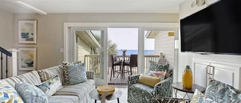 Imaging relaxing in this spacious living room with ocean views