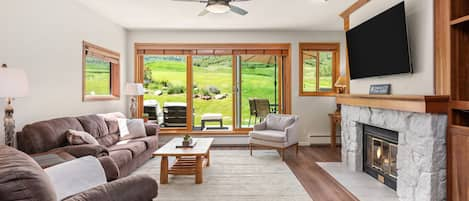 Living room with wood-burning fire place