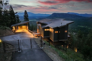 Coded security gate, carport with 50amp EV charger, & the views are breathtaking