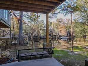 Enjoy the swing facing the river!