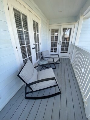 Front porch off of Living room and Master bedroom 