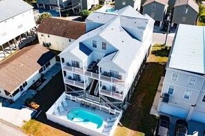 Back of house with swimming pool