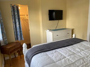 Queen size bed in front bedroom. 
