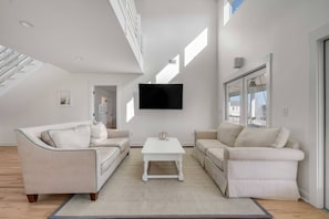The Penthouse is newly renovated with new hardwood floors, furniture, bathrooms, staircase and paint.