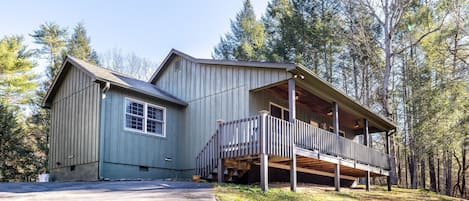 Exterior of cabin with paved parking area