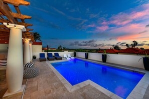 Posh Private pool of the Villa in Noord Aruba - Dive into a refreshing poolside escape - Enjoy leisurely moments in inviting pool area - Experience ultimate relaxation in poolside paradise