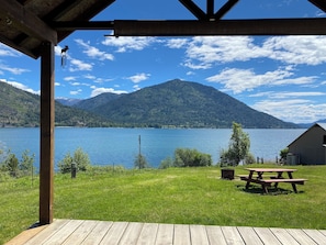 The view of Lake Pend Oreille from the covered porch faces southeast toward Eagan Mountain