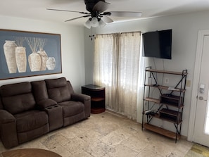 Recliners & window to view waterfall & pool.