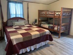 Bedroom #1 Master suite, queen bed and bunkbed set. Separate AC/heating unit.
