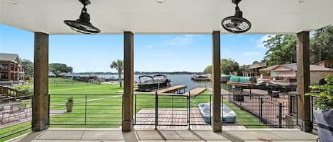 Downstairs porch with lake front view.