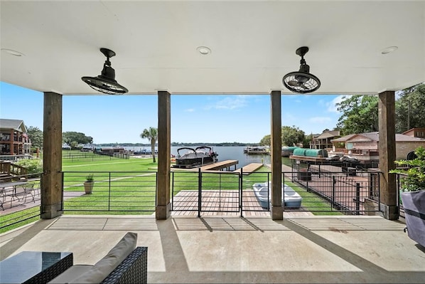 Downstairs porch with lake front view.