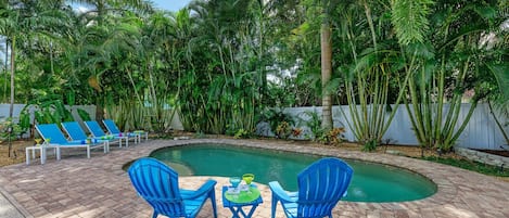 backyard view with pool at Sea La Vie