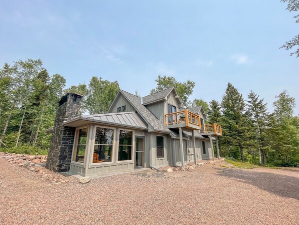 Wheel Hus Retreat is a 3-bedroom, 2-bathroom inland home with year-round Lake Superior views (better in the winter!).