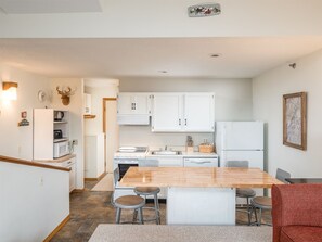 View of dining/kitchen area with seating for four