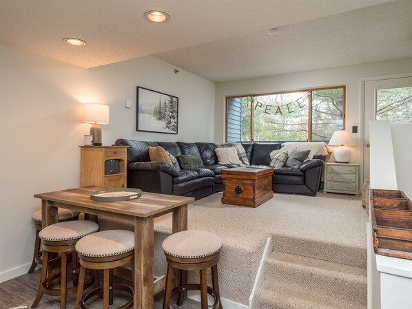 living area and kitchen on upper level