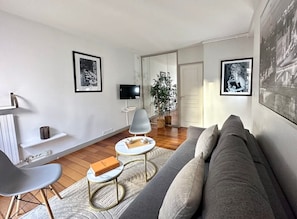 Comfortable living room setup, perfect for relaxation or accommodating guests