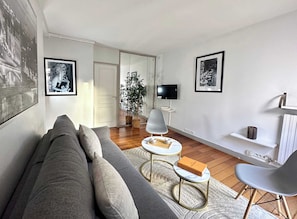 Comfortable living room setup, perfect for relaxation or accommodating guests
