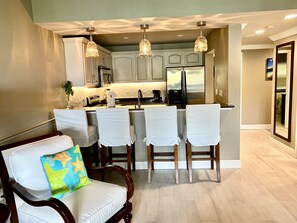 View from Family Room, Looking in to the Kitchen of the 1 Bedroom Unit Side.