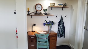 Office alcove. Wifi codes and manual are here.
