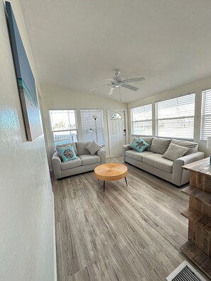 Living room from laundry center hallway