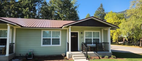 Unit D is an end unit of a 4 plex. Porch seating for two.