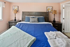 Comfortable king bed with high quality linens in the lower level Master bedroom with ensuite bath