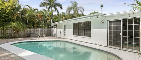 Enjoy the Florida weather poolside. 