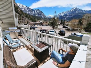Fire table, grill, seating out on the deck, great way to enjoy the Ouray sunset!