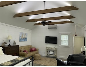 Exposed Solid Walnut Beams with accent lighting