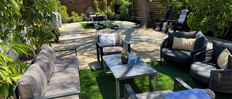 Enjoy the sun while sitting in your own private yard with 2 BBQs and lots of seating