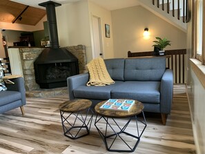 Living room with gas fireplace for cozy, convenient fires.