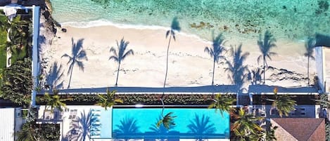 Aerial view of infinity pool and private beach