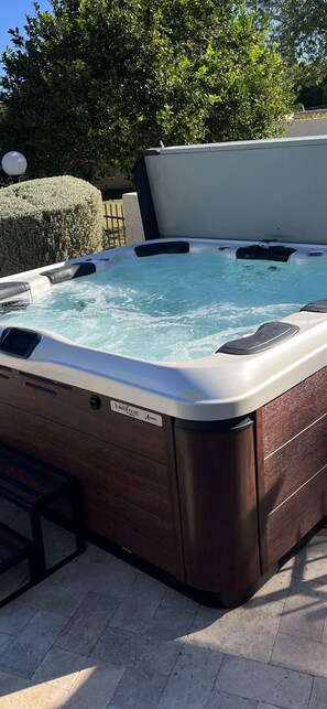 8 person Spa.If you choose to wear a suit,  it must be free of laundry soap ever