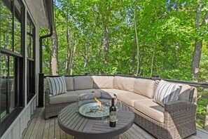 Sectional outdoor sofa and gas fire table

