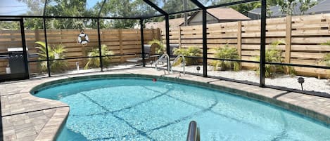 The saltwater, heated pool has a pool light & a new screen enclosure 