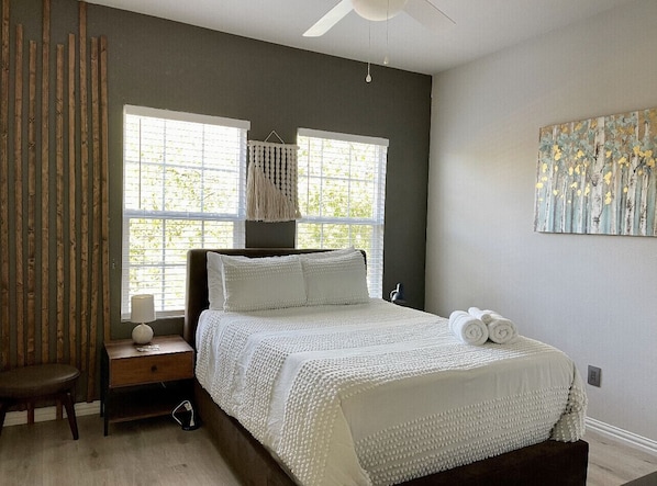 Rear right bedroom with full bed abs rollaway twin in closet.