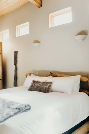 Primary bedroom features a king bed and a full ensuite bathroom