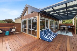 The wraparound deck is the ultimate spot for sunset BBQs