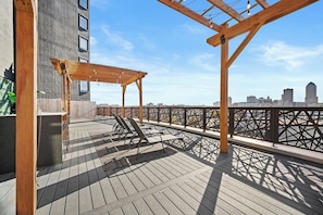 On the skyline terrace, you'll find multiple pergolas, seating options, decorative lights and so much more... all while taking in exceptional views!