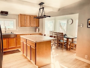 Light and bright with new appliances. Bar and dining seating. Open floor plan 