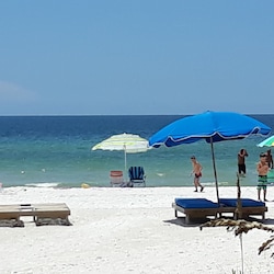 Indian Shores. You are able to rent the chaises and umbrellas. Ask for number.