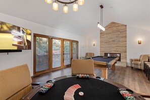 Game room (main level) - Pool table & poker table w/fire place