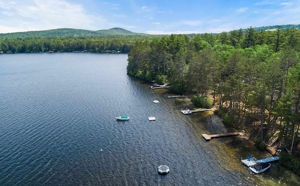Peaceful, clean lake with mountain views.