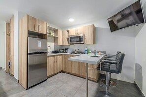 Kitchen space enough for preparing your daily meals